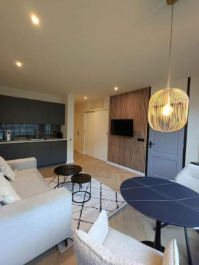 Modern appartement vlak bij strand
